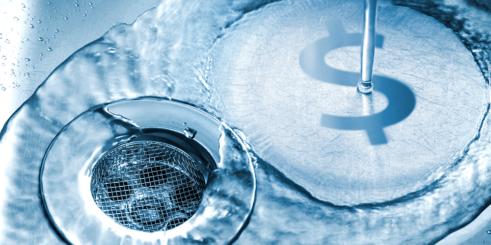 Sink with running water with dollar sign projected inside.