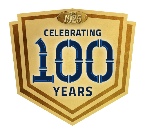 Gold placard speaking of Heiden celebrating 100 years in service.